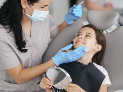 little-beautiful-girl-dentist-smiling
